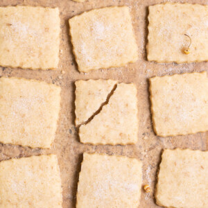 Chamomile shortbread cookies, with one broken in half