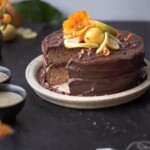 A chocolate earl grey cake with a slice removed