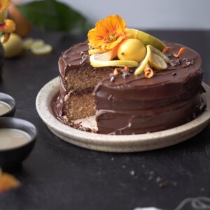 A chocolate earl grey cake with a slice removed