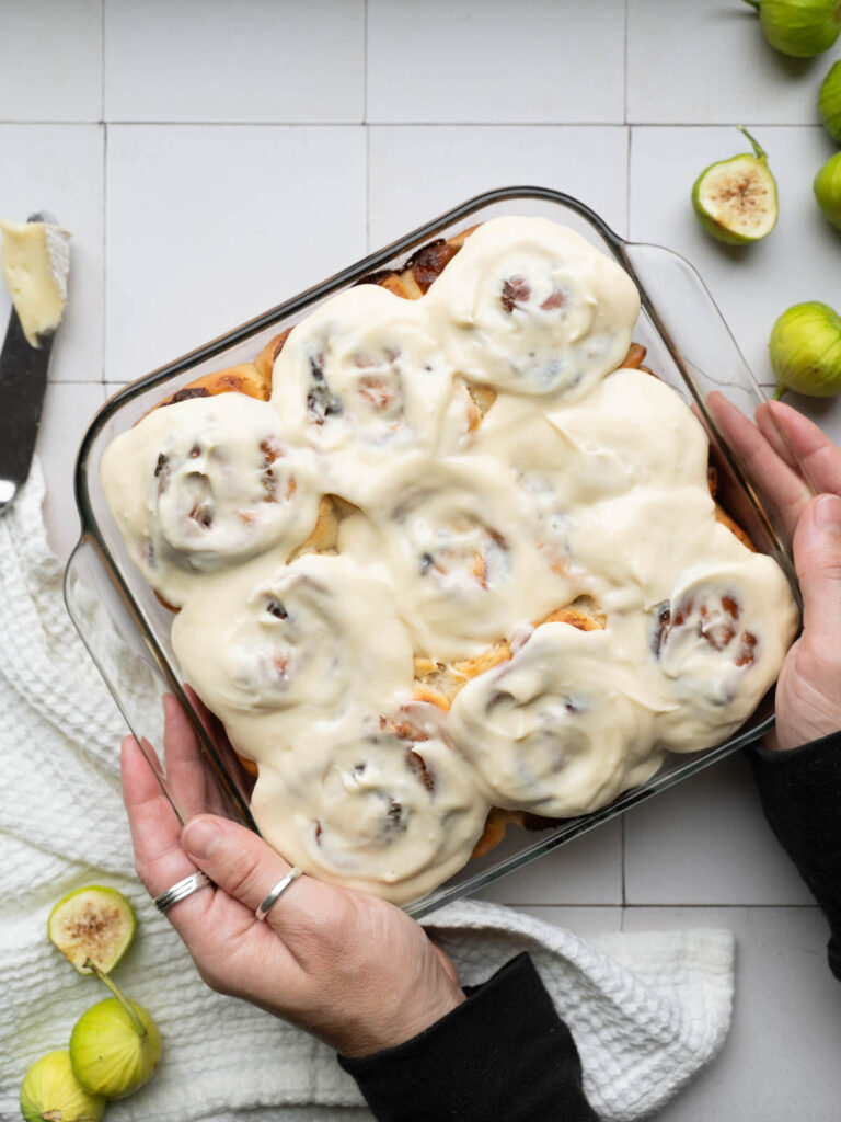 A pan of freshly frosted homemade cinnamon rolls