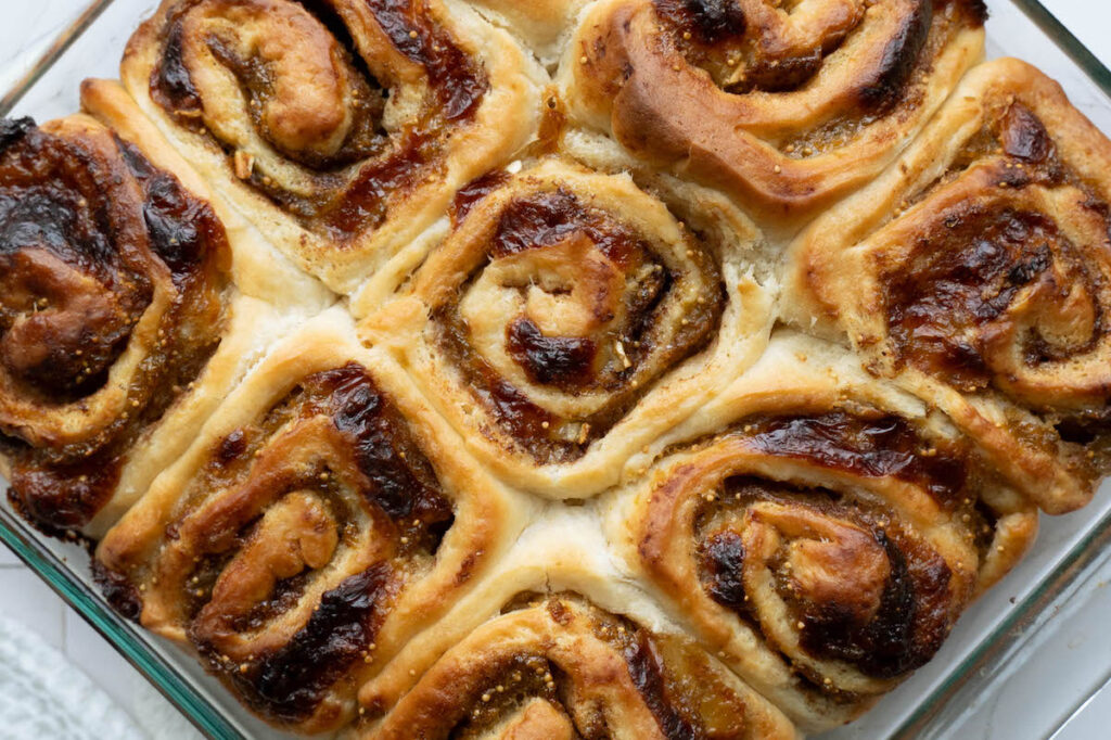 Freshly baked cinnamon rolls filled with homemade fig butter