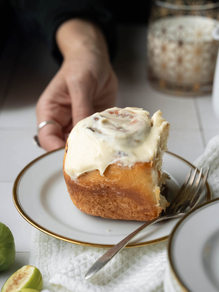 A homemade cinnamon roll on a plate