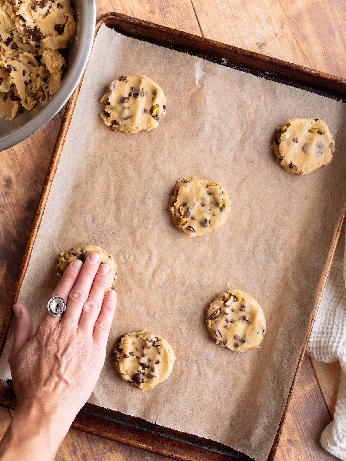 Flattening cookie dough balls before baking