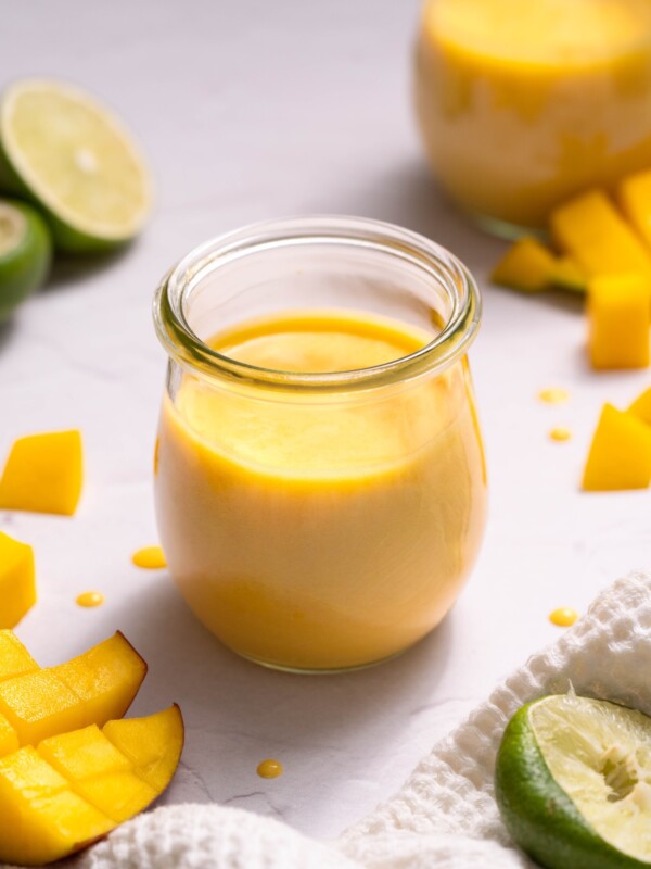 Homemade mango curd in a glass jar
