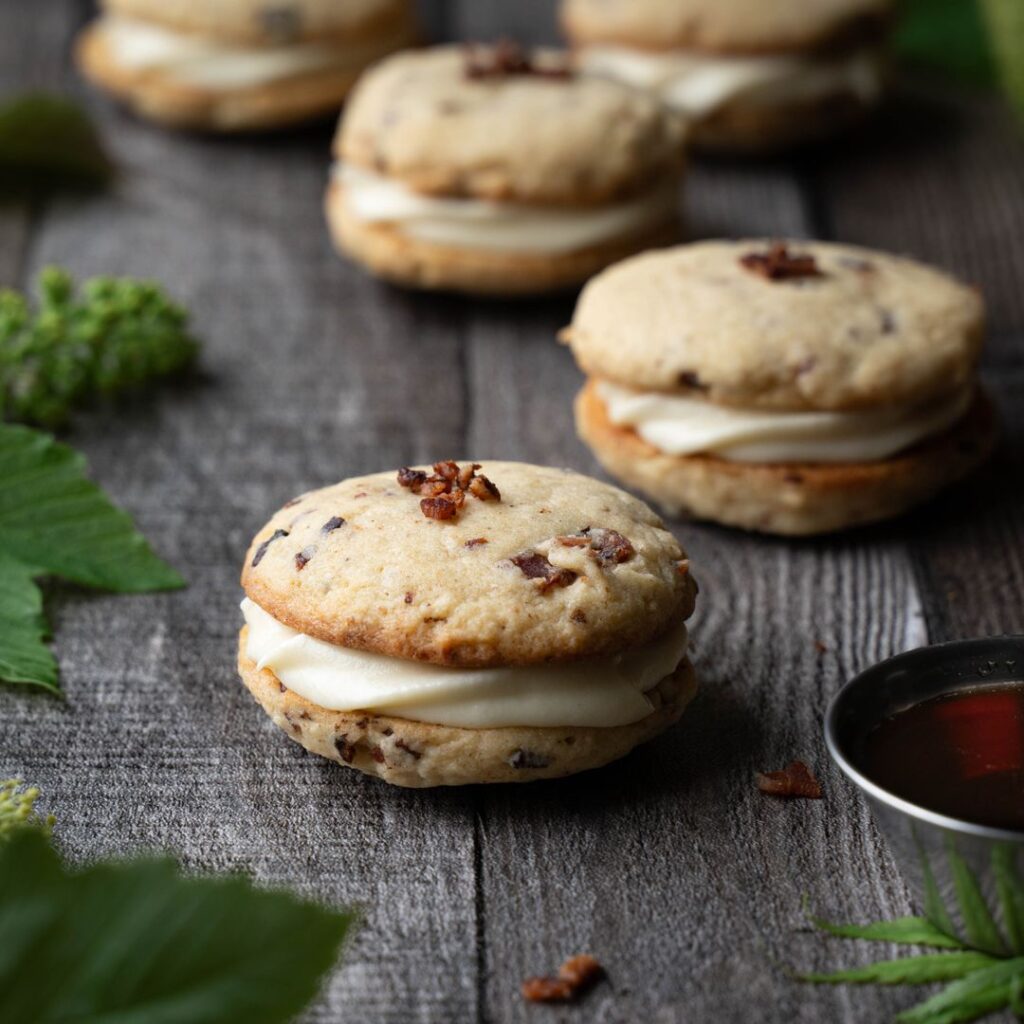 Maple bacon cookies sandwiched with maple cream cheese frosting