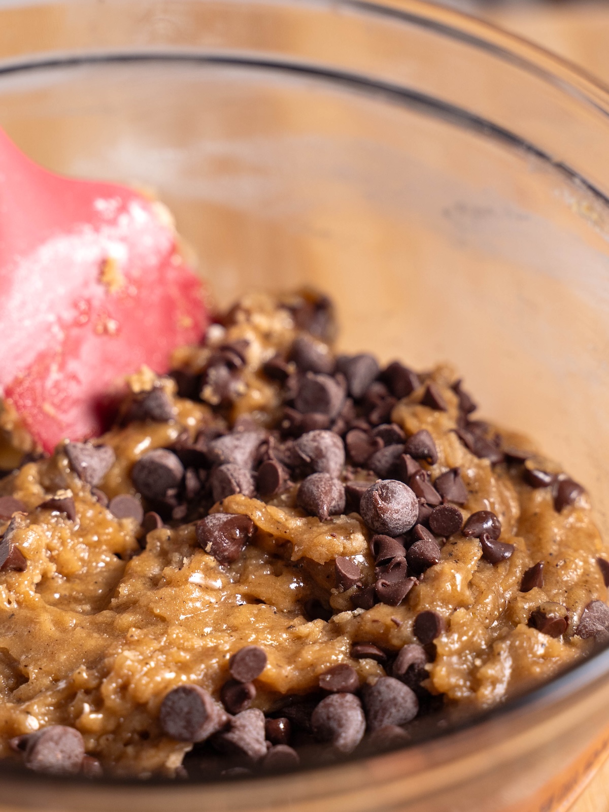 Folding chocolate chips into blondie batter