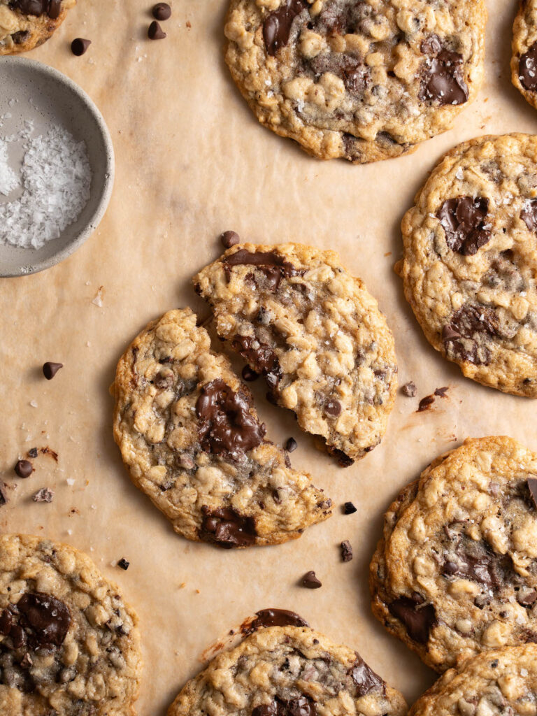 Oatmeal chocolate chip cookies on a sheet pan