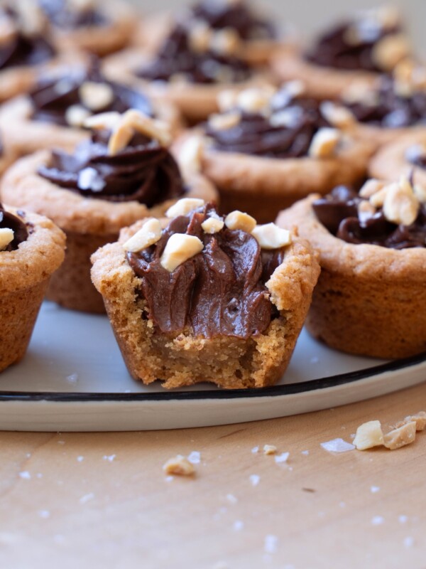 A bite taken out of a peanut butter chocolate cookie cup