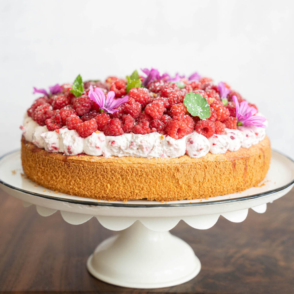 Raspberry shortcake on a cake plate