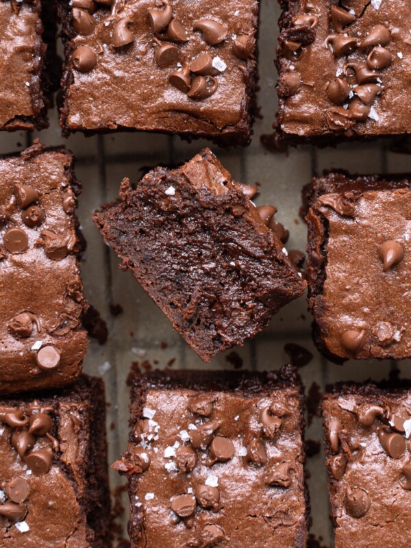 A bunch of sourdough brownies, with one turned over to show side view