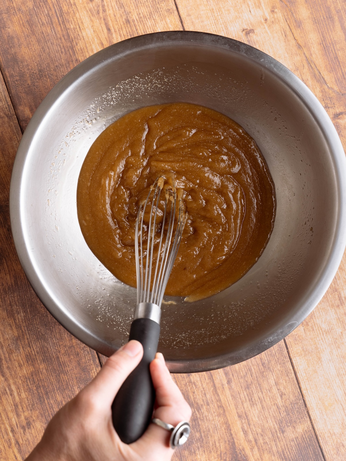 Whisking sugar and melted butter together