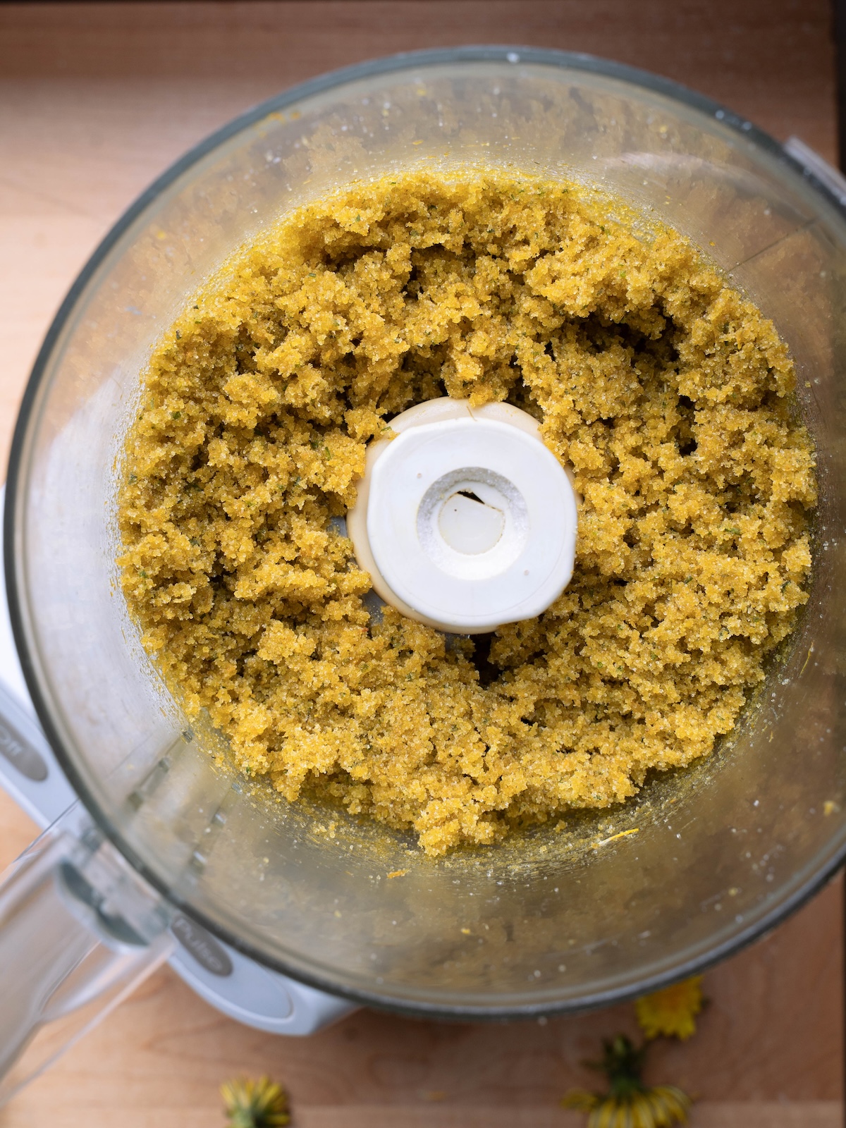 Sugar and dandelion flowers blended together in a food processor