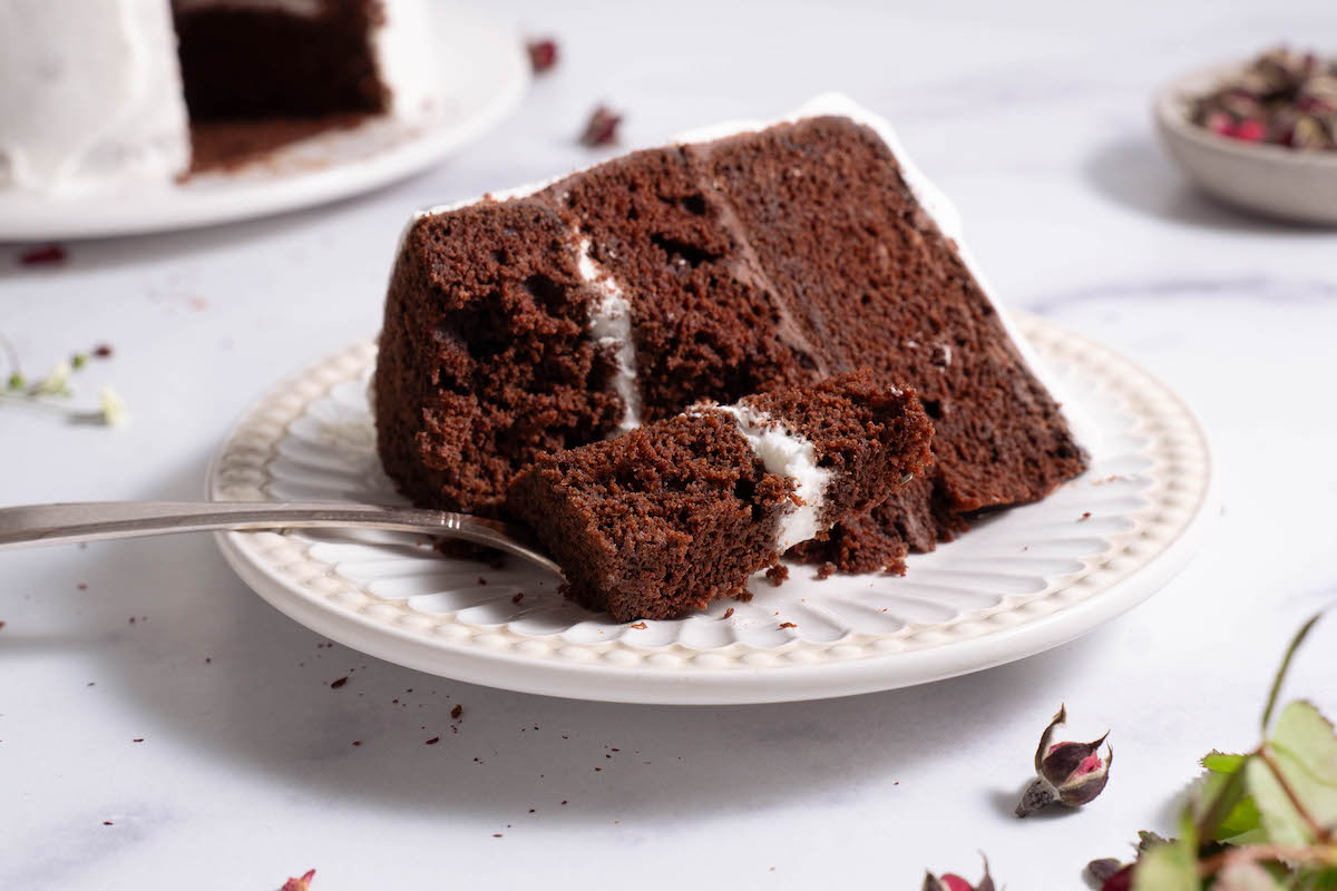 Taking a bite out of a chocolate rose cake
