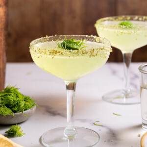 Two fir tip lemon drop martinis ready to serve