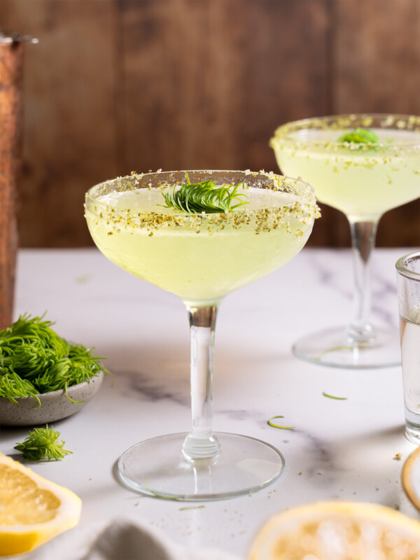 Two fir tip lemon drop martinis ready to serve