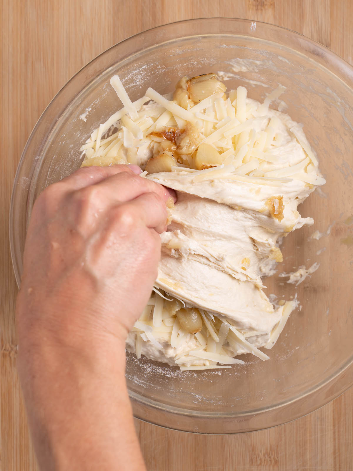 Folding roasted garlic and parmesan into sourdough