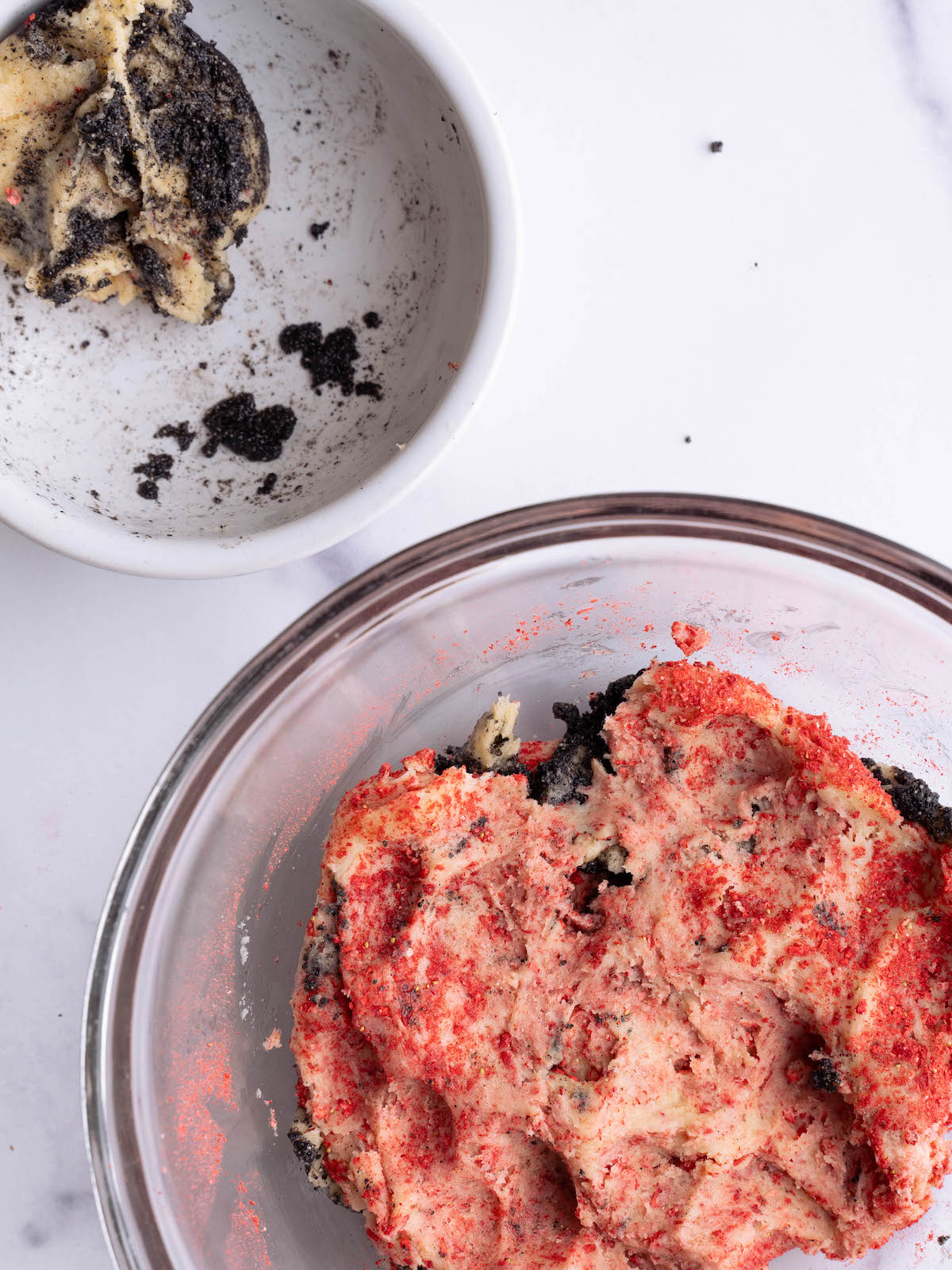 Mixing two cookie doughs together to create a swirl effect