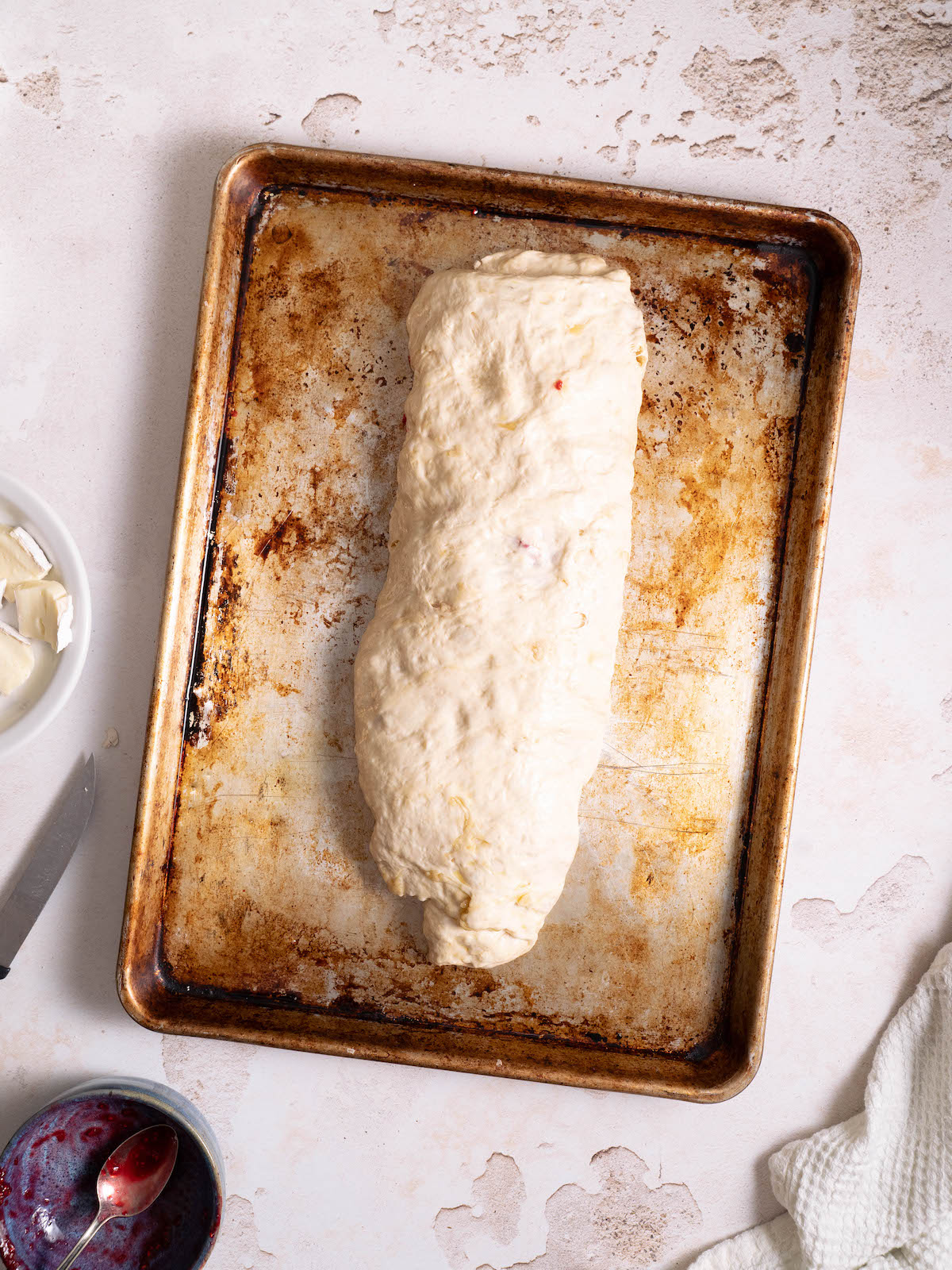 Raspberry brie focaccia rolled into a log shape