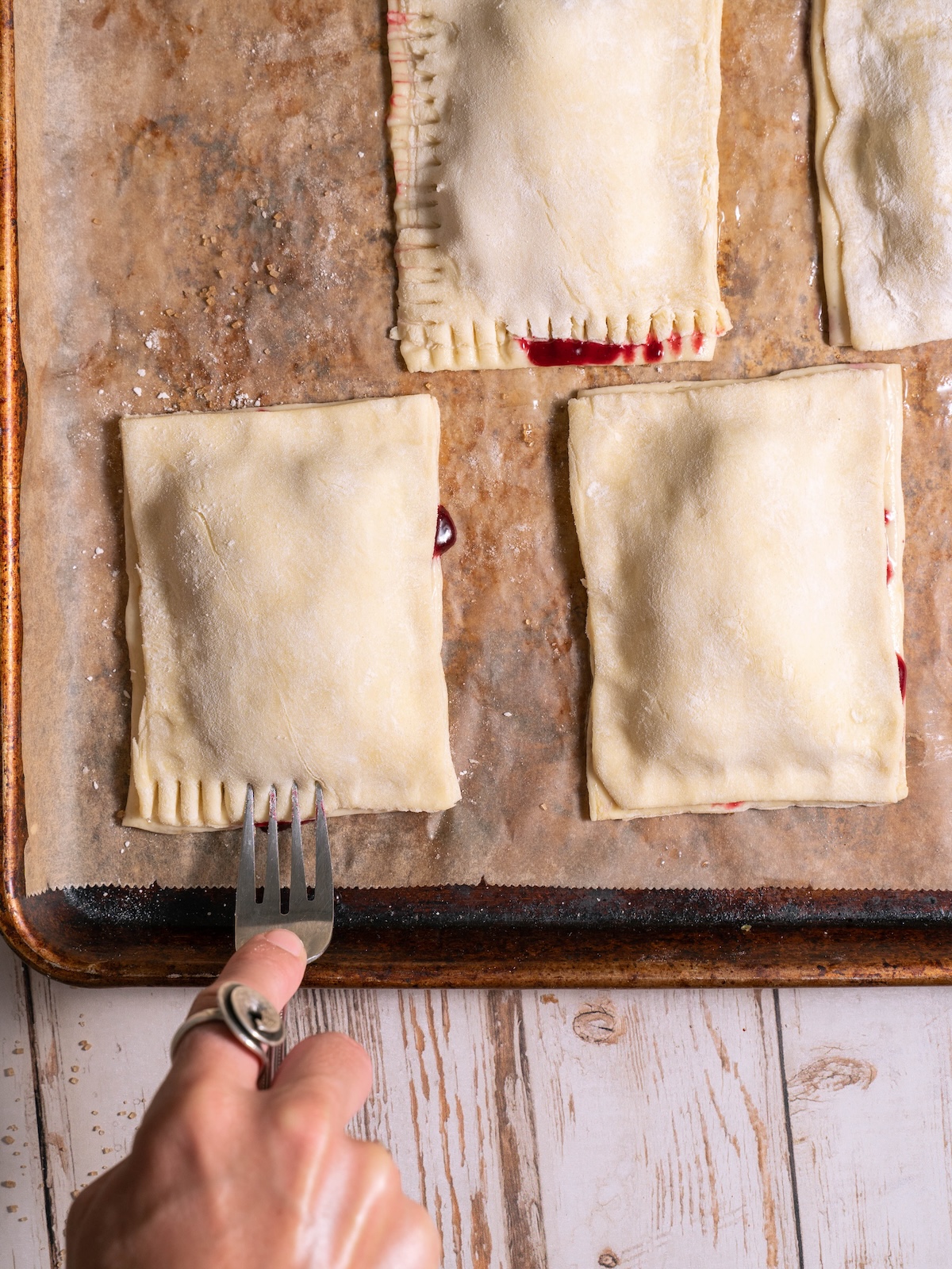 Crimping pies shut with a fork