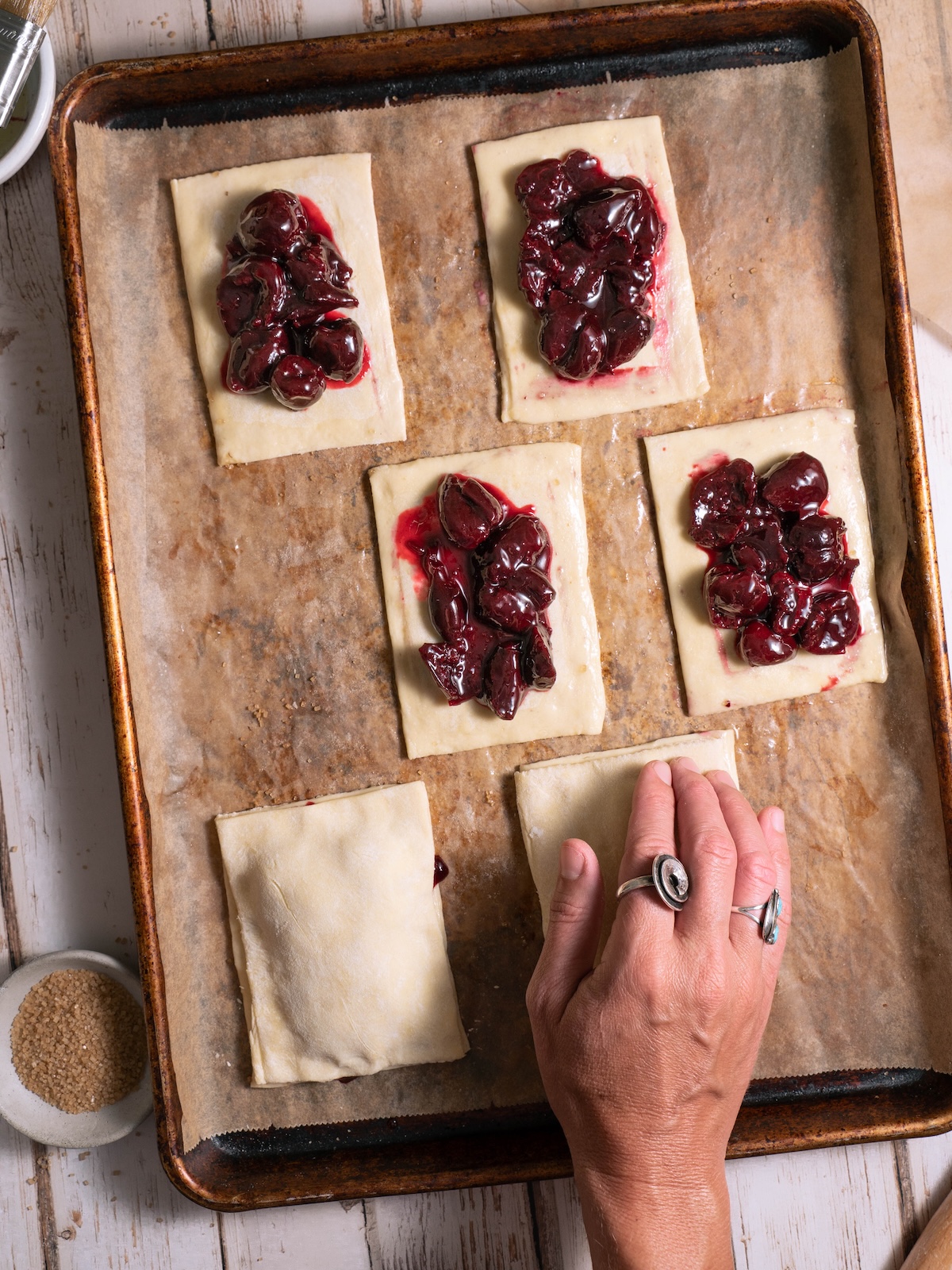 Filling hand pies with cherry filling