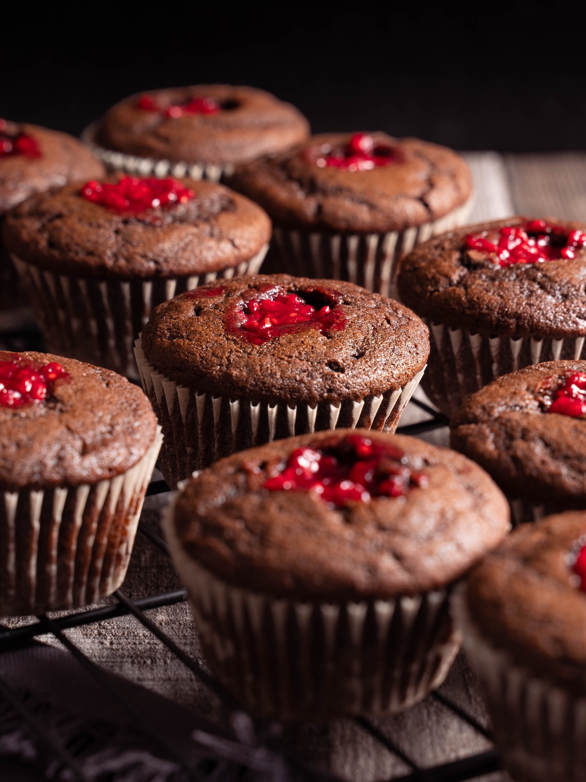 Chocolate cupcakes filled with homemade raspberry jam