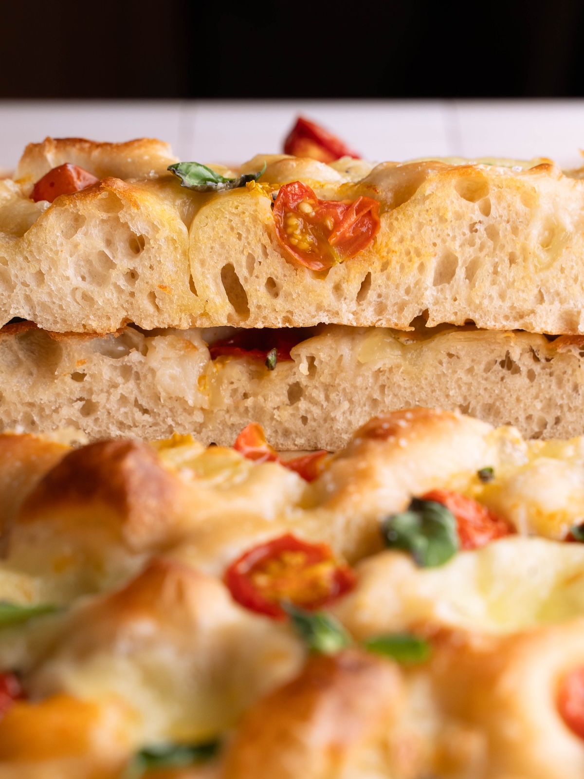 Layers of Caprese focaccia stacked on top of each other