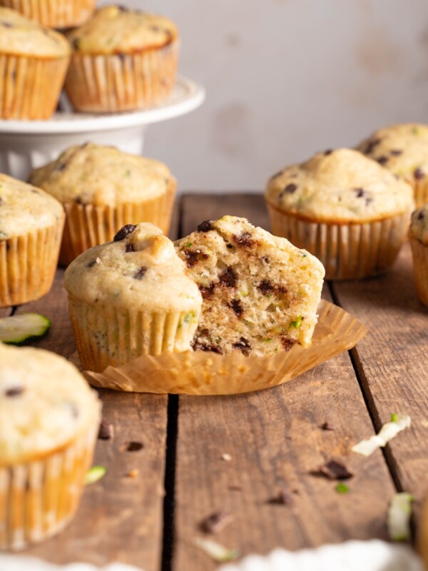 Zucchini muffins on display, one split in half to show inside