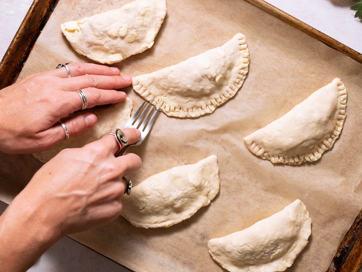 Crimping pies shut with a fork