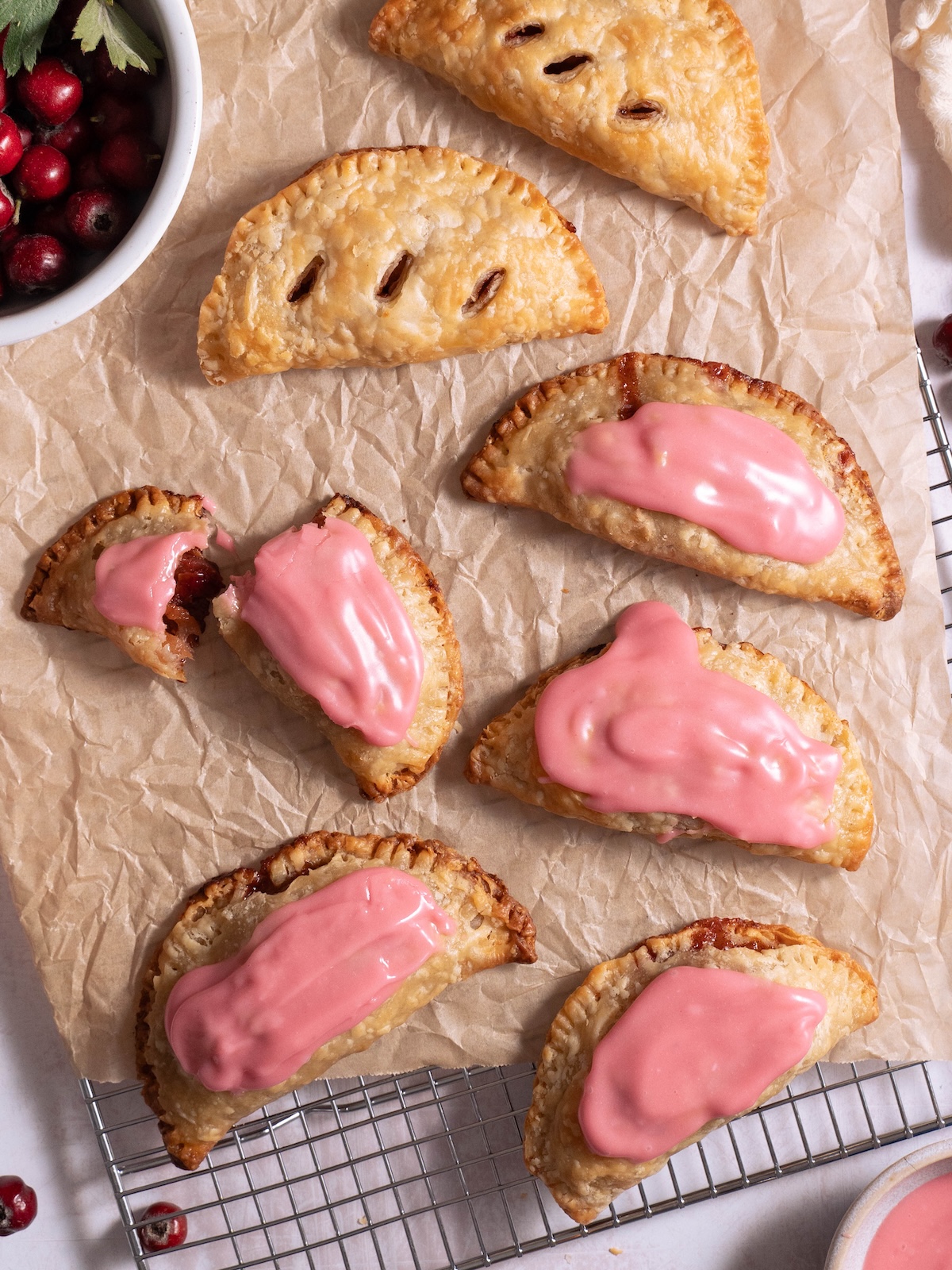 Little hand pies with pink hawthorn glaze