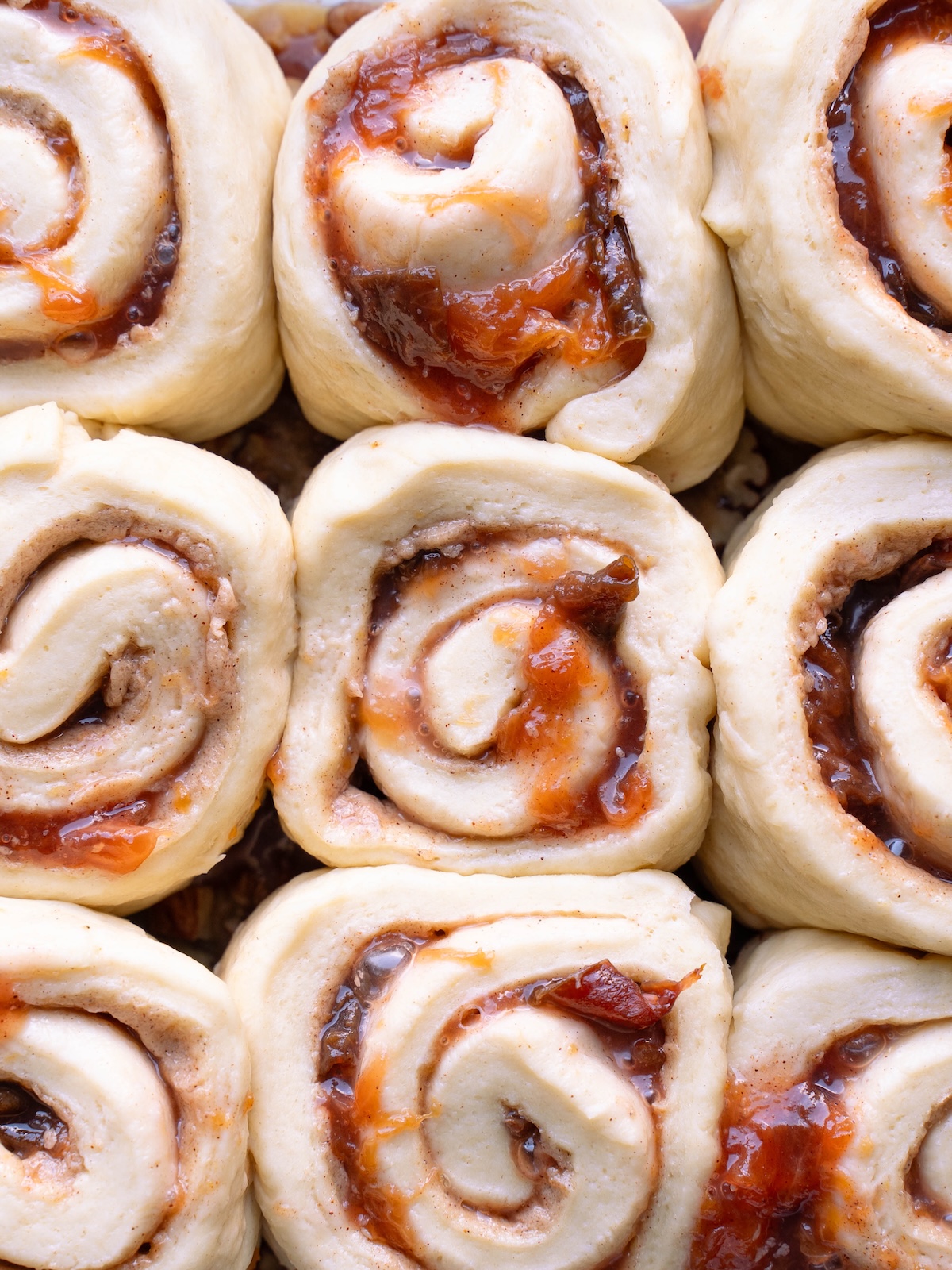 Plum cinnamon rolls, proofed and ready to bake