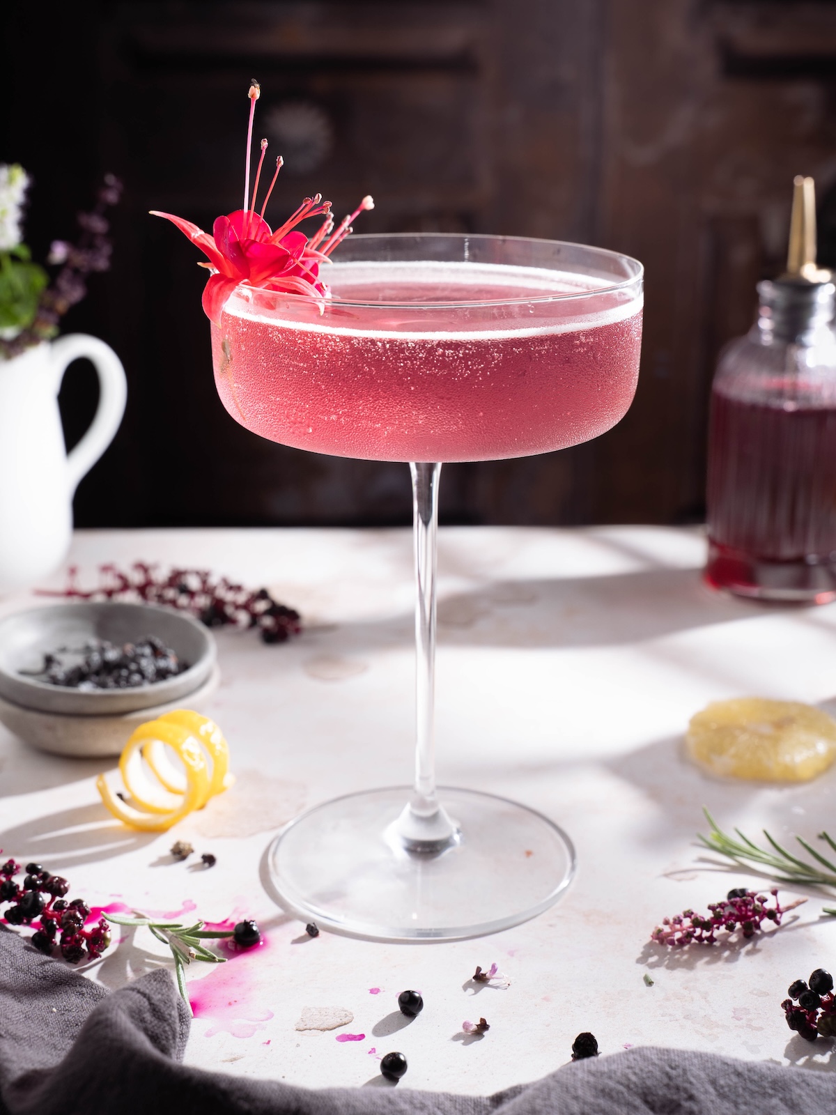 An elderberry drink made with vodka and elderberry simple syrup