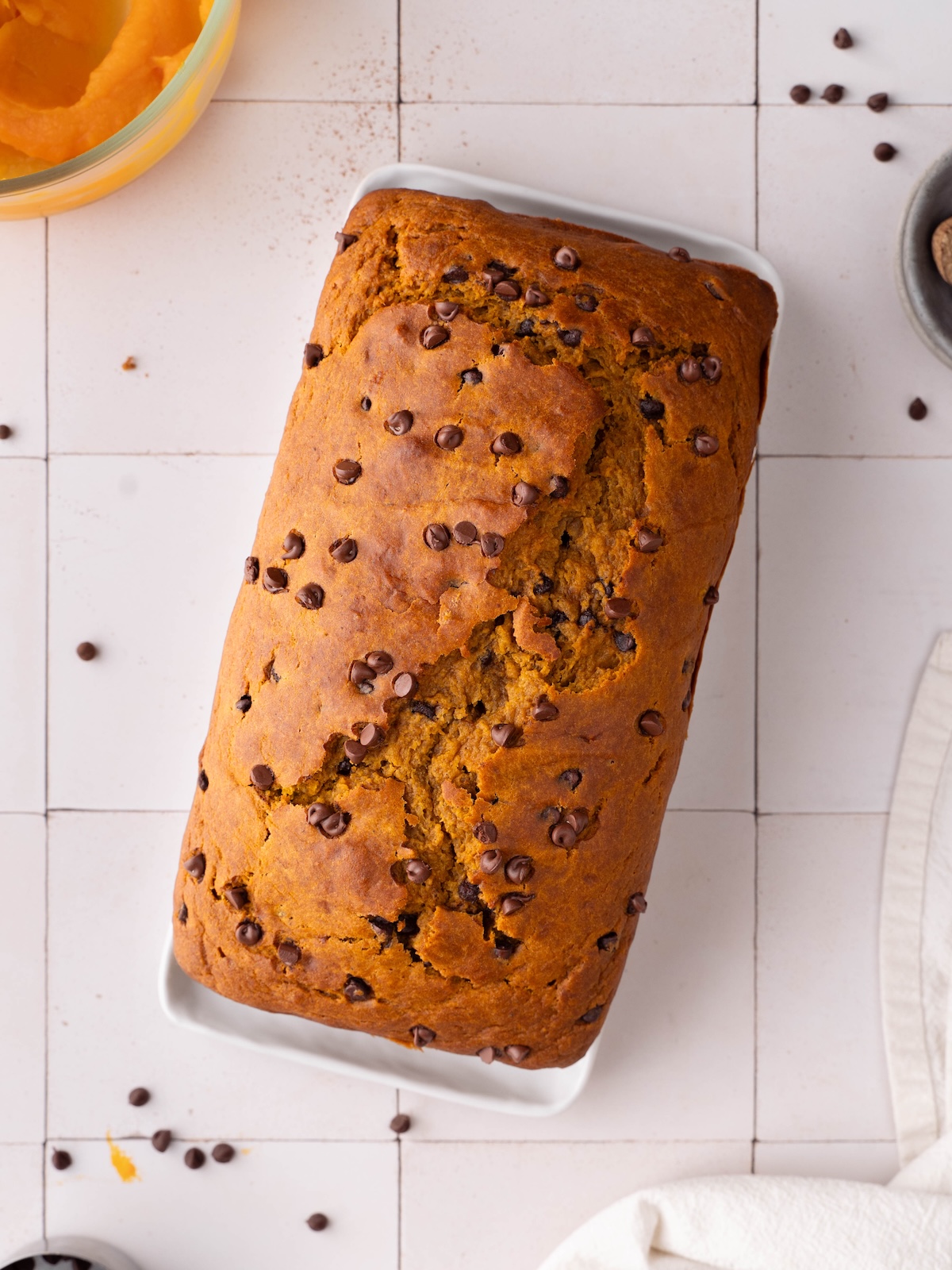 A freshly baked loaf of chocolate chip sourdough pumpkin bread