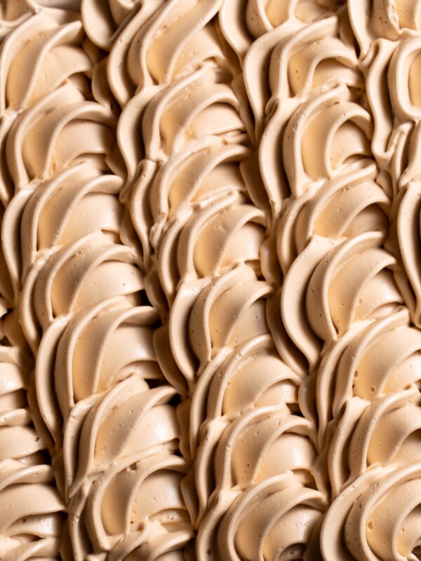 Swirls of brown sugar buttercream piped into shell shapes