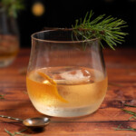 An old fashioned made with pine needle syrup