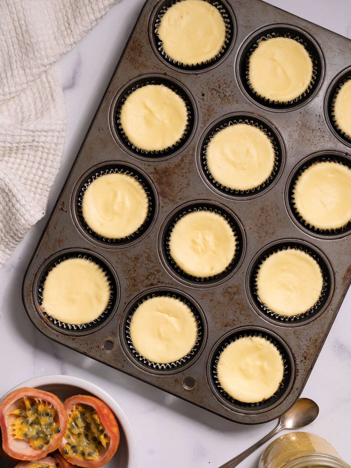 Miniature cheesecakes after baking