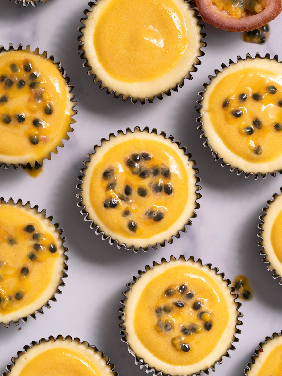 Mini cheesecakes topped with passionfruit