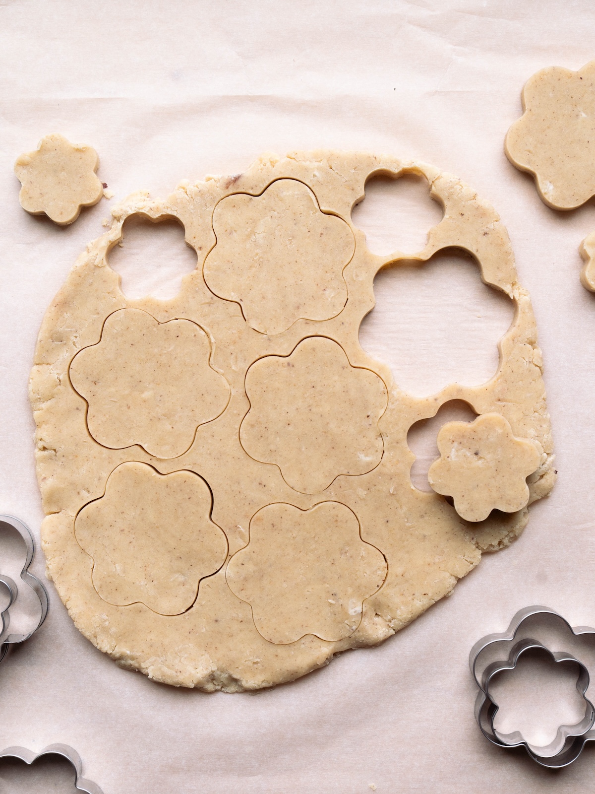 Cookie dough cut into flower shapes