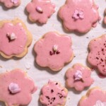 Magnolia shortbread cookies with blood orange glaze and edible flowers