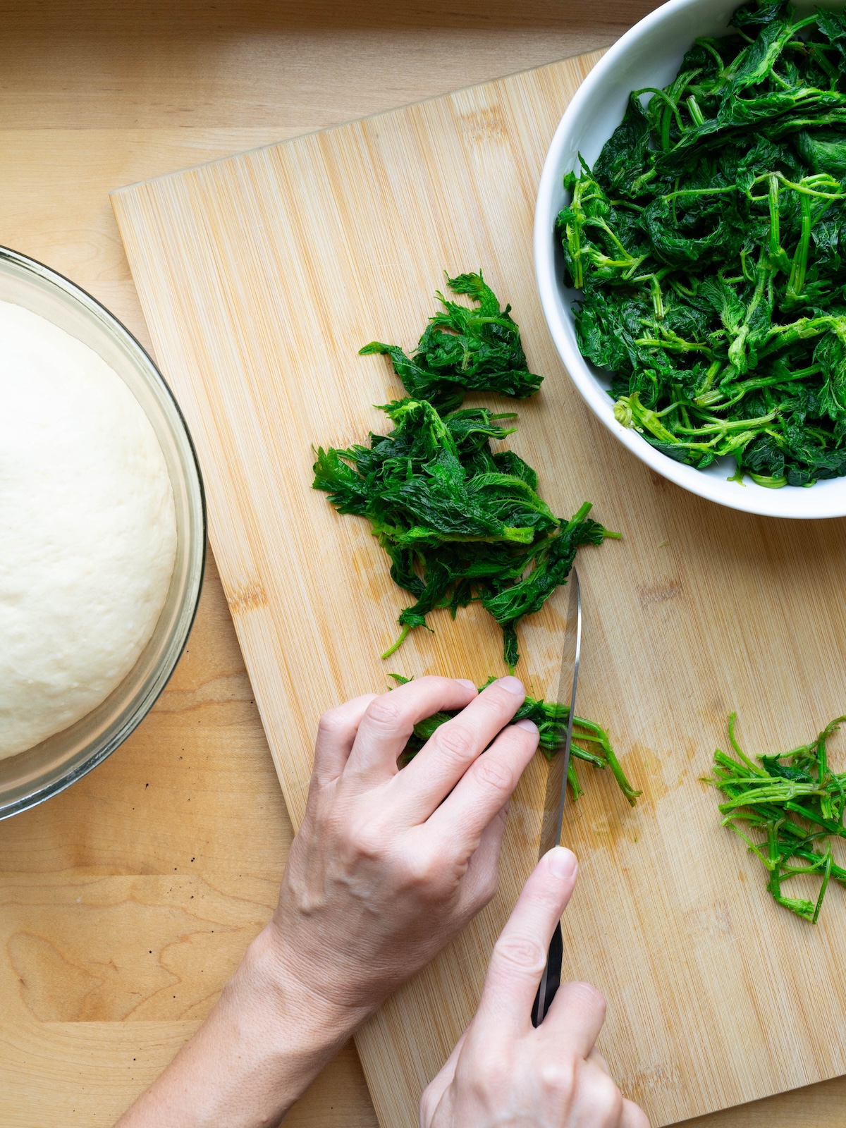 Chopping cooked nettles