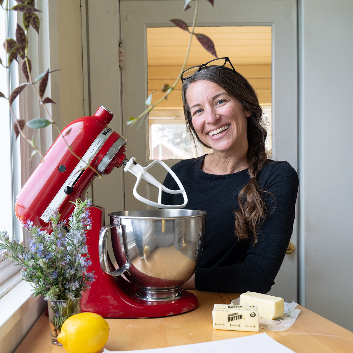 Karie in her kitchen making cookies