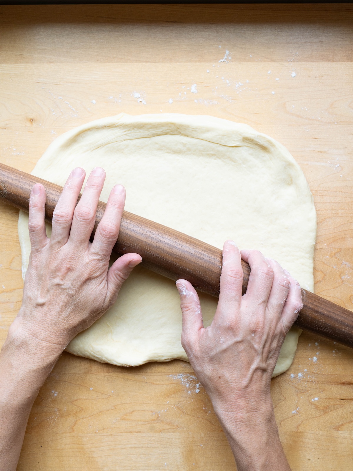 Rolling out savory roll dough