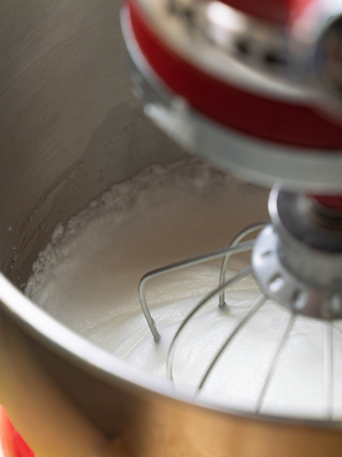 Egg whites whipping in a mixer