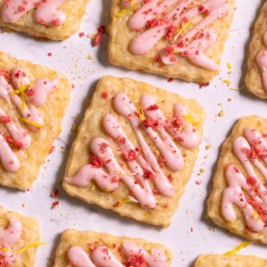 Dandelion shortbread cookies drizzled with strawberry glaze