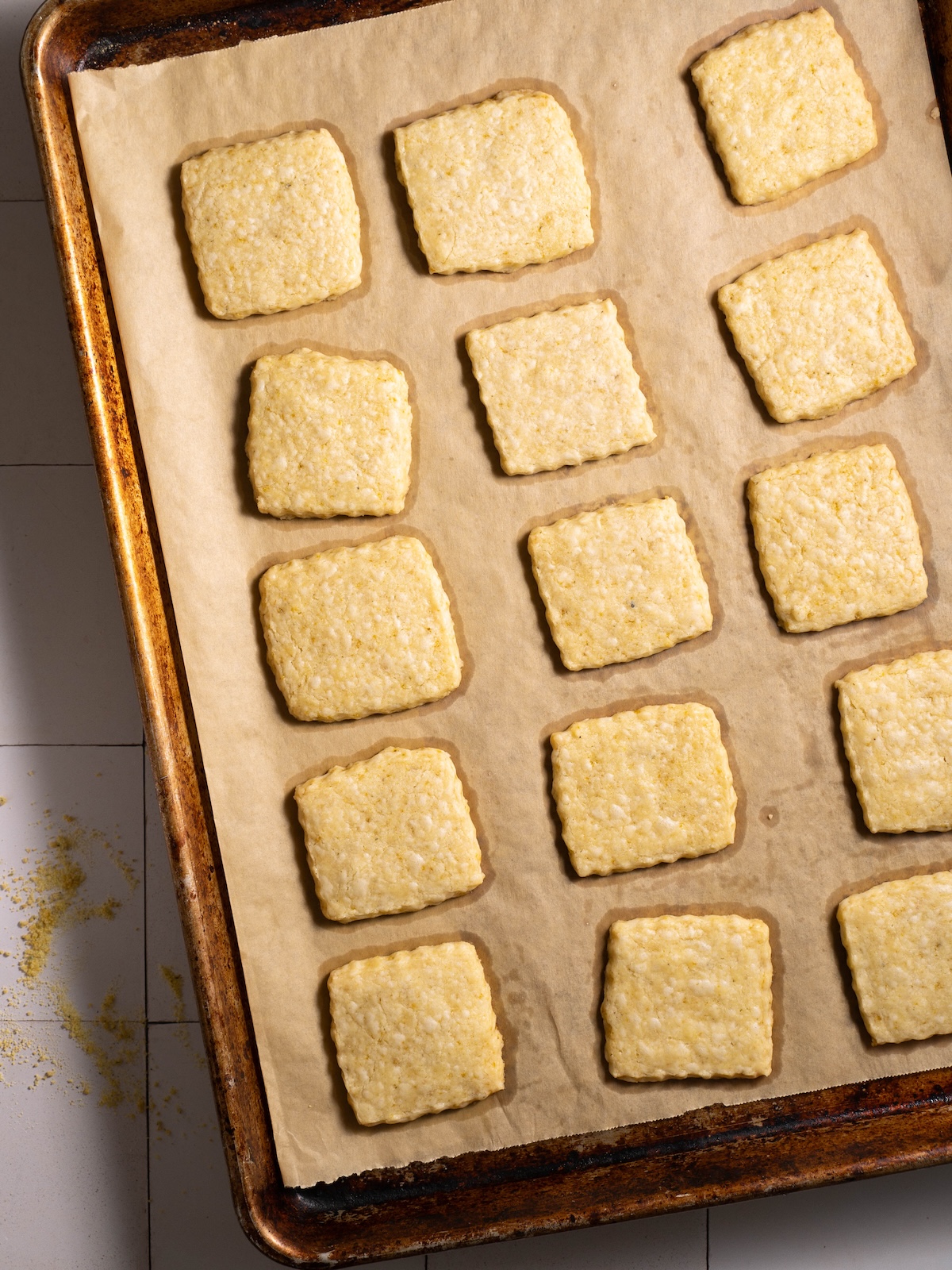Dandelion cookies on a baking sheet just after baking