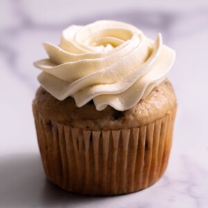 A cupcake topped with floral buttercream