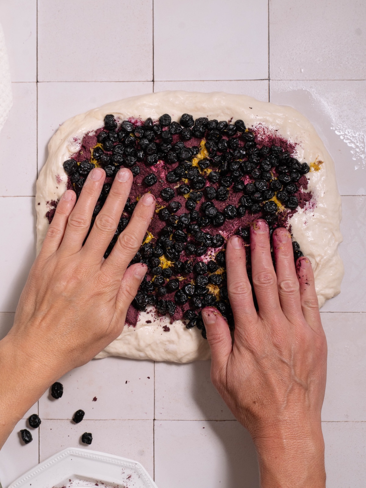 Laminating sourdough with dried blueberries, blueberry powder, and lemonn zest