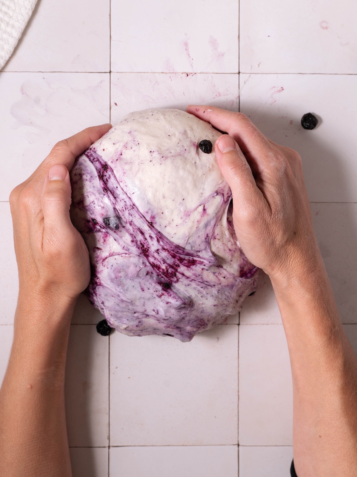Shaping sourdough bread into a boule
