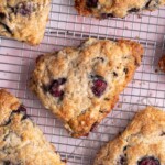 Fresh cherry scones cooling on a cooling rack