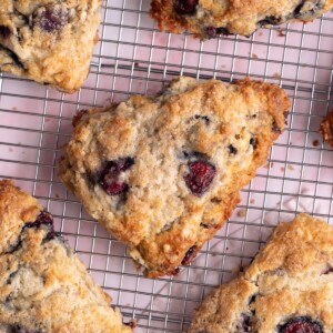 Fresh cherry scones cooling on a cooling rack