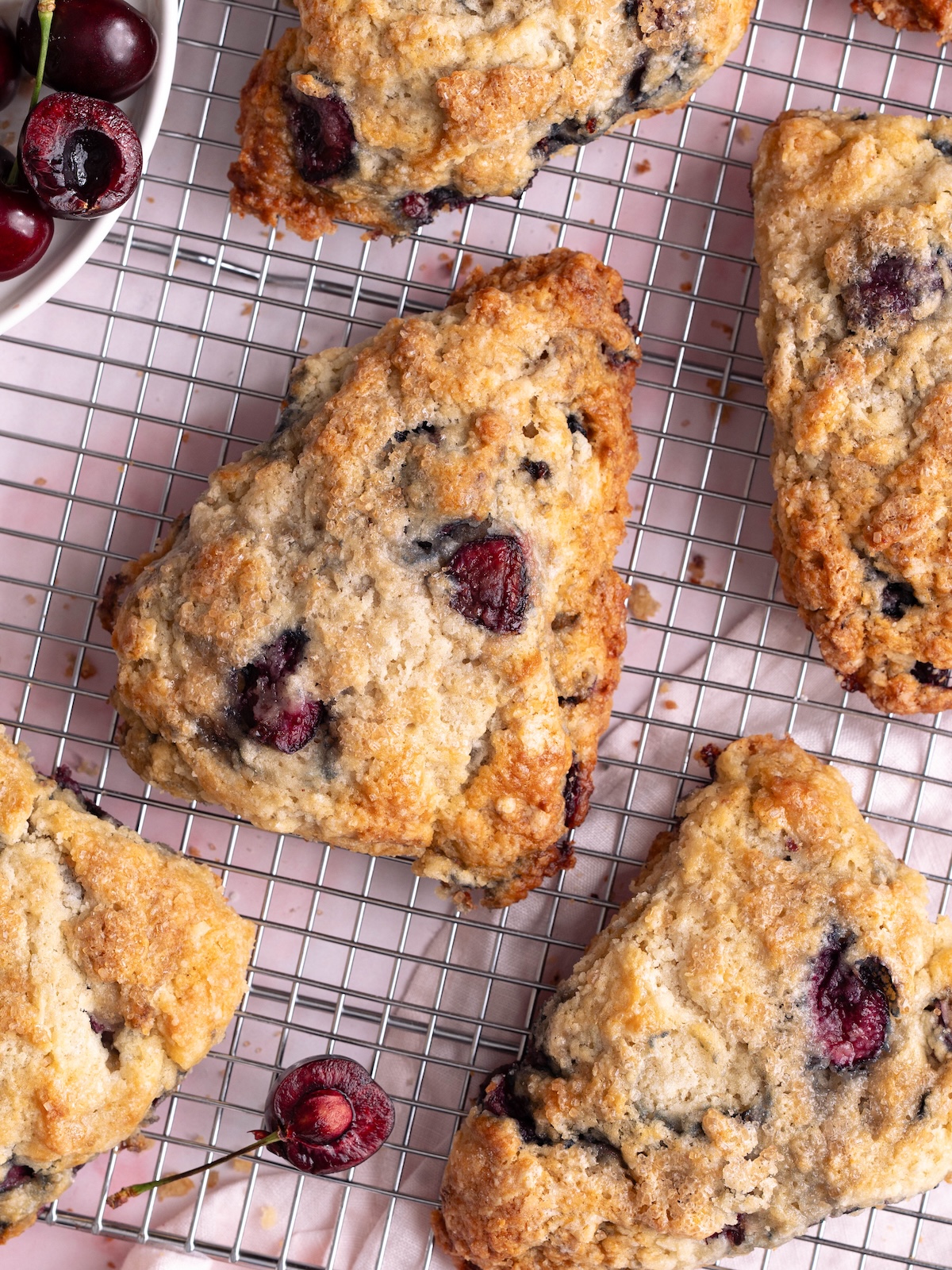 Fresh cherry scones on a cooling rack